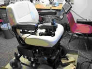 : In this figure, the test wheelchair is shown; the wheelchair is a Golden Alante wheelchair frame with customized controller with caster and drive wheel encoders.